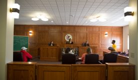 Students working in the courtroom
