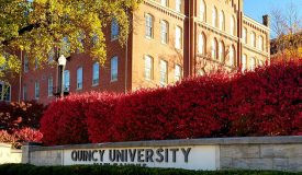 West View of QU Sign and Francis Hall