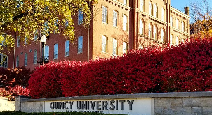 West View of QU Sign and Francis Hall