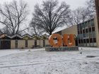 QU Sign in front of Helein Hall Winter Time