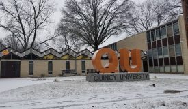 QU Sign in front of Helein Hall Winter Time