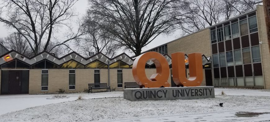 QU Sign in front of Helein Hall Winter Time