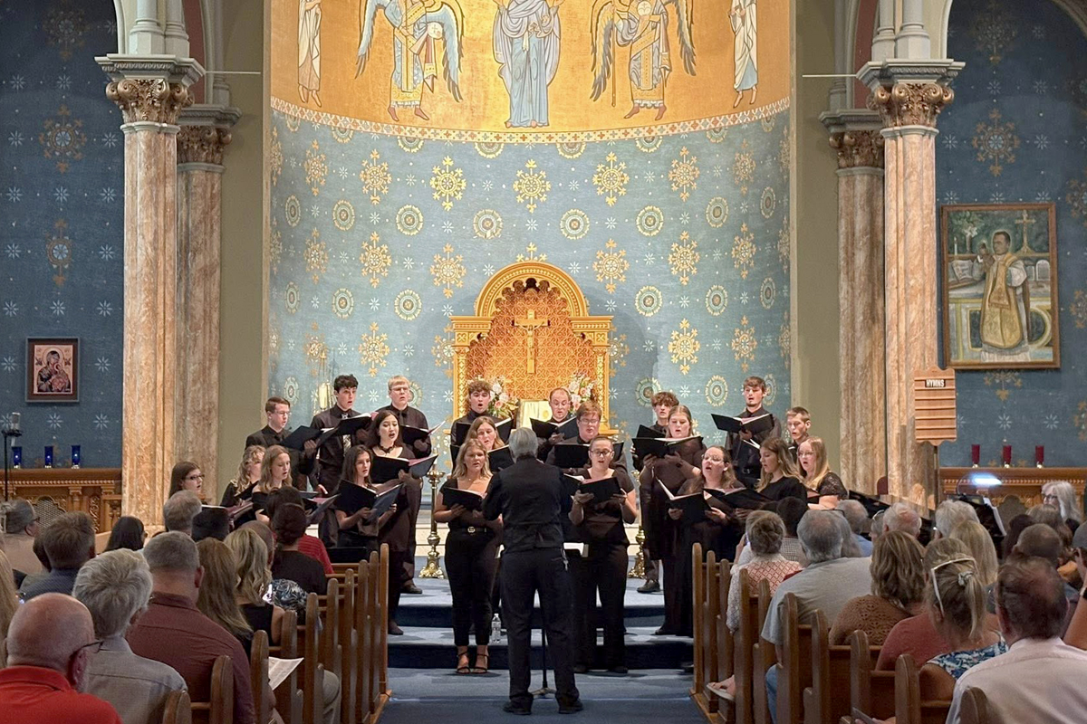 Choir performing in the QU Chapel