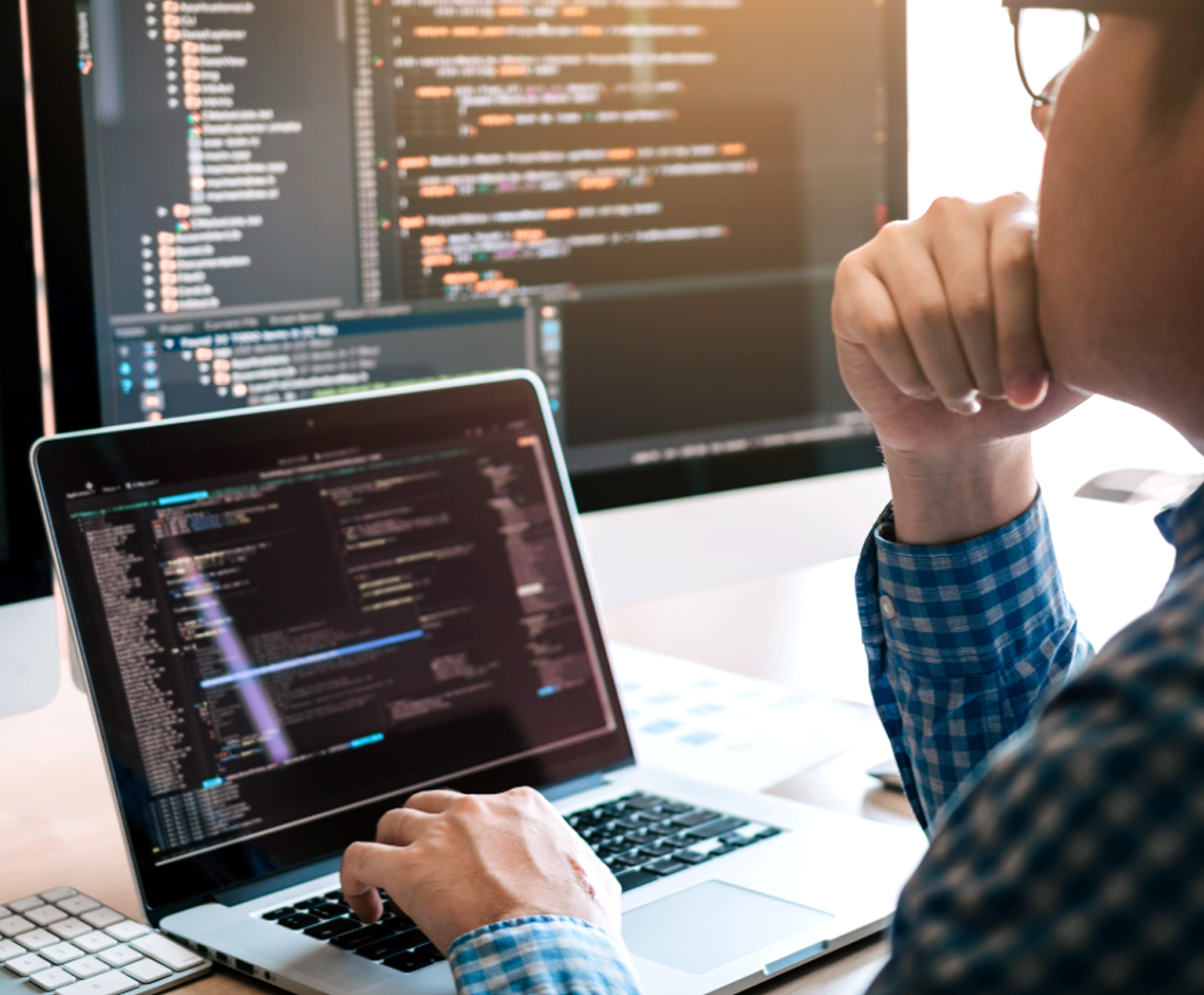 Student working on laptop with engineering software