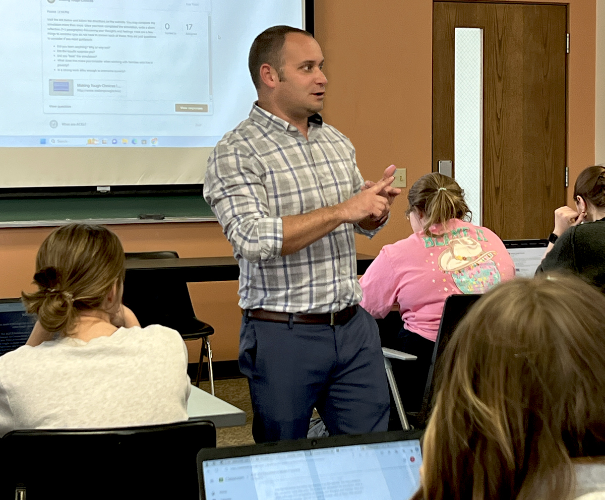 professor speaking in front of education majors classroom
