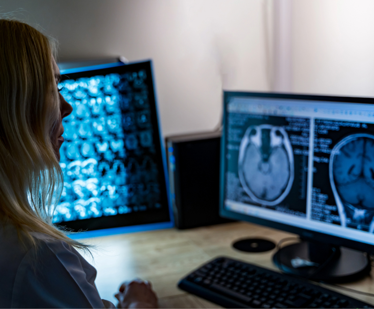 student looking at computer screen with radiology images