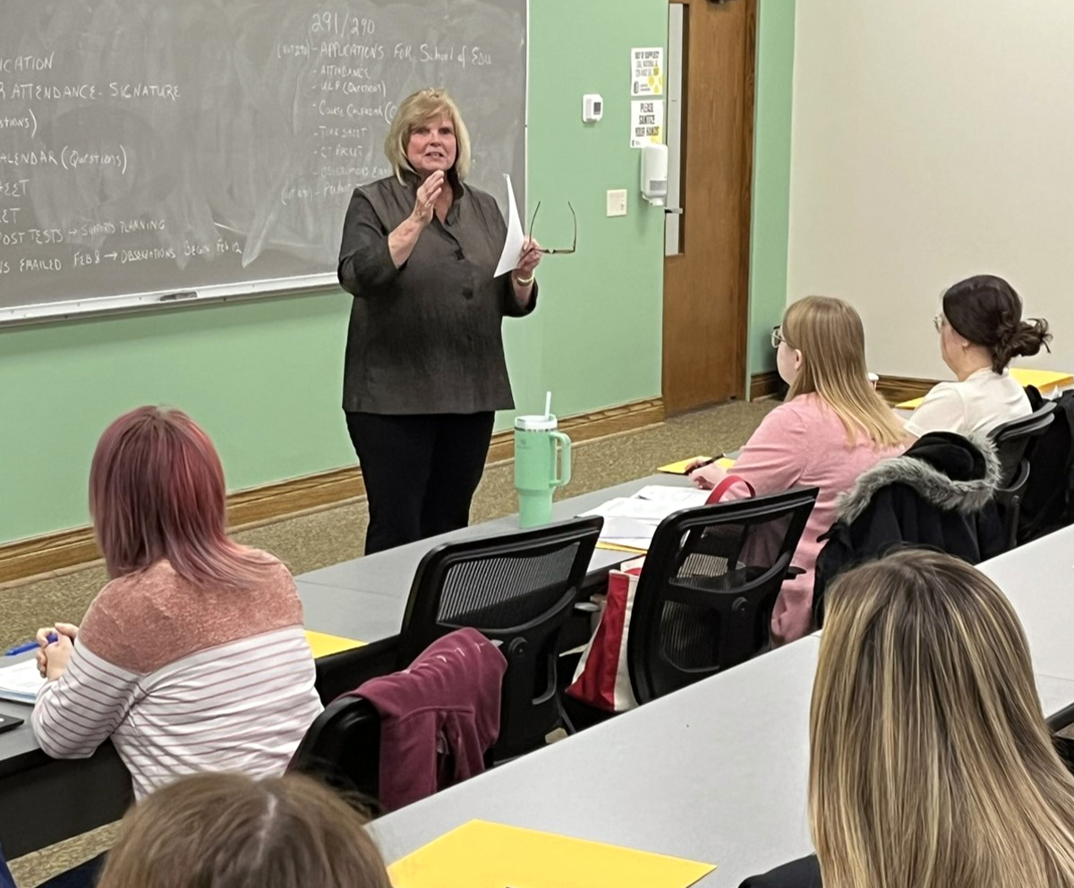 Education instructor speaking to a class