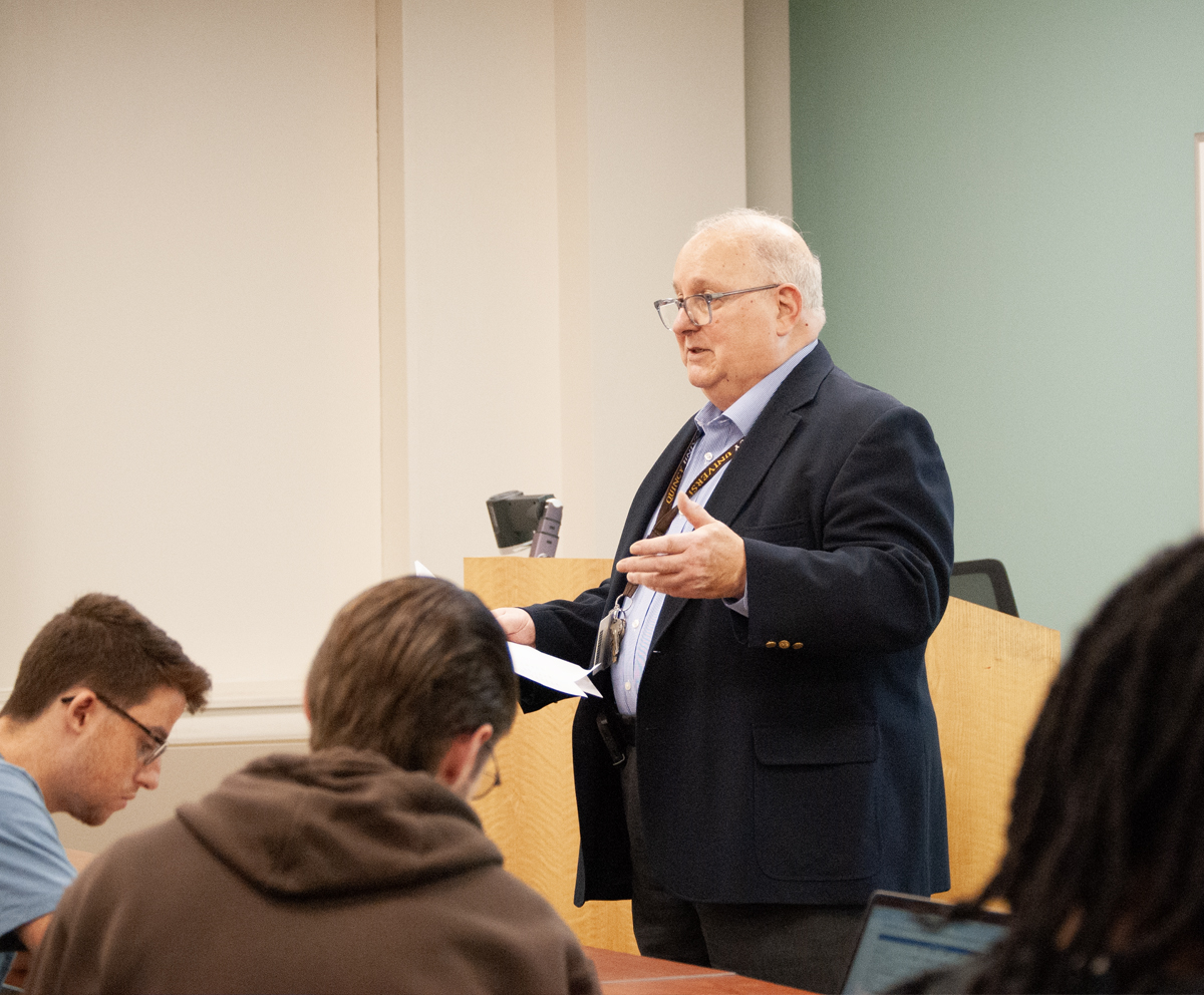 Business Analytics professor speaking in front of class