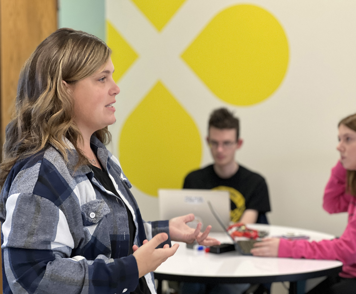 Education professor talking in class