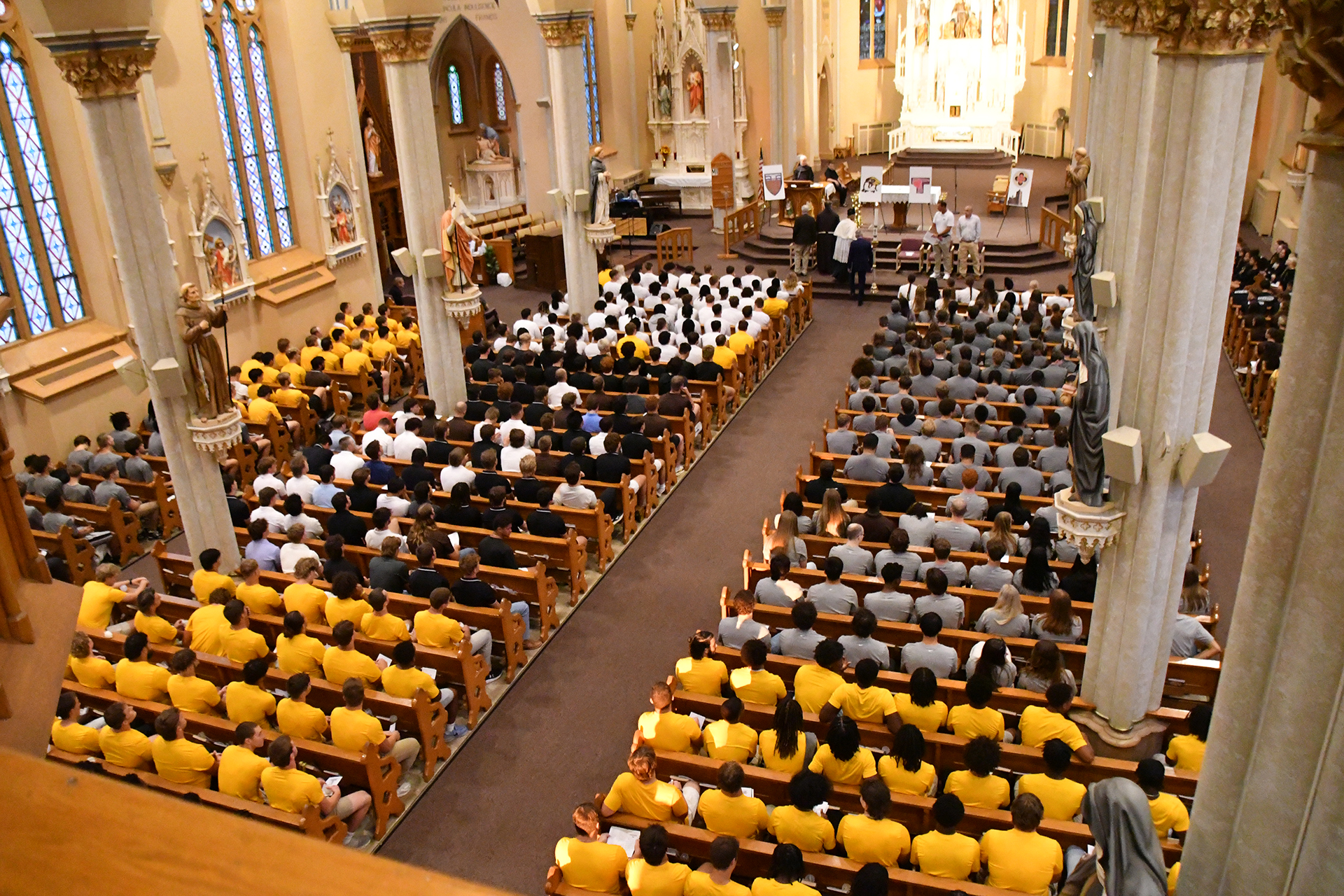 gathering of all of the student athletes for a blessing ceremony.