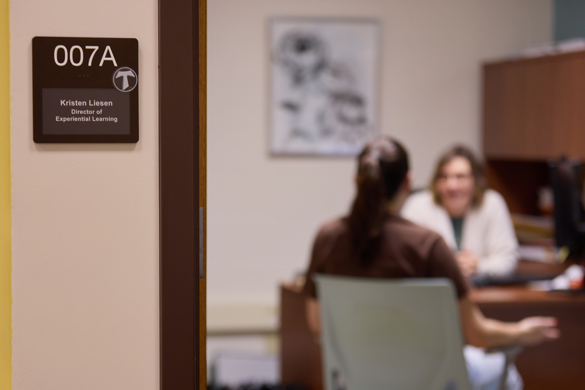 student and Advisor talking