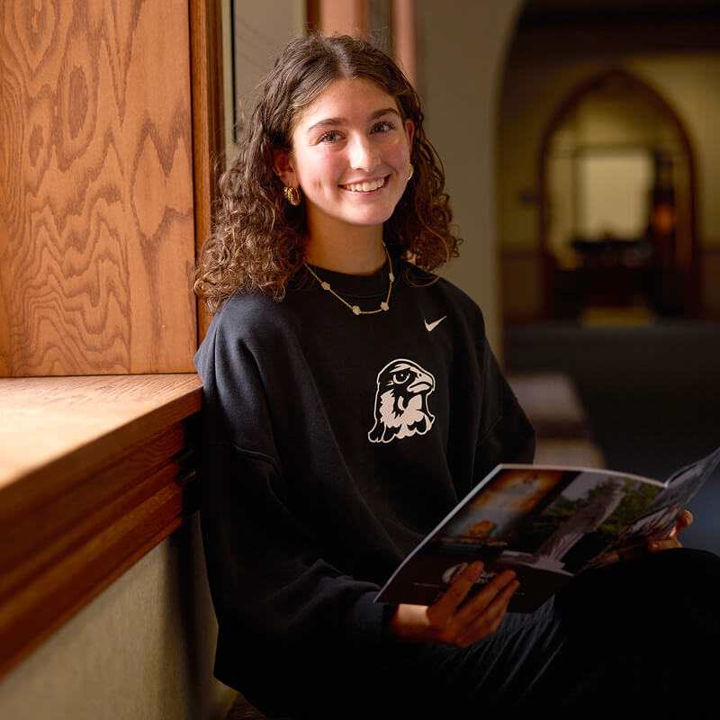 Interior close up of student next to window
