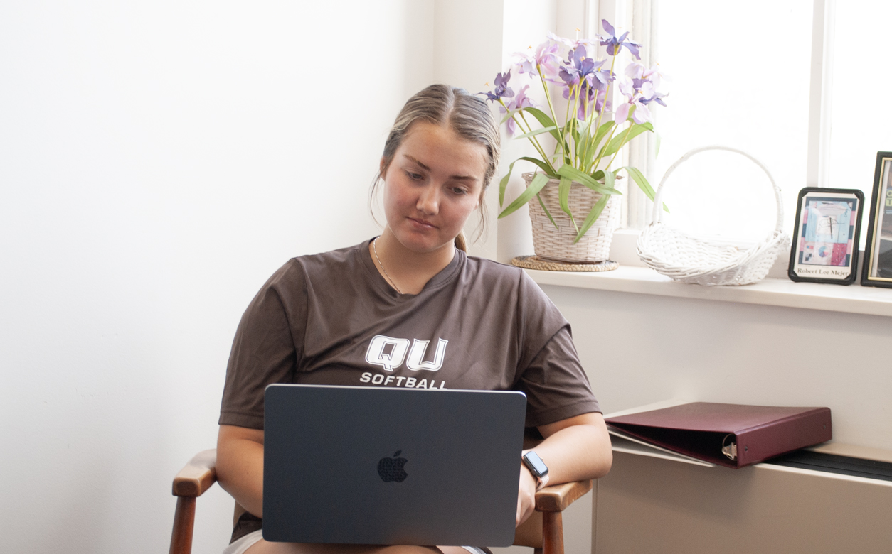 Female student working on laptop