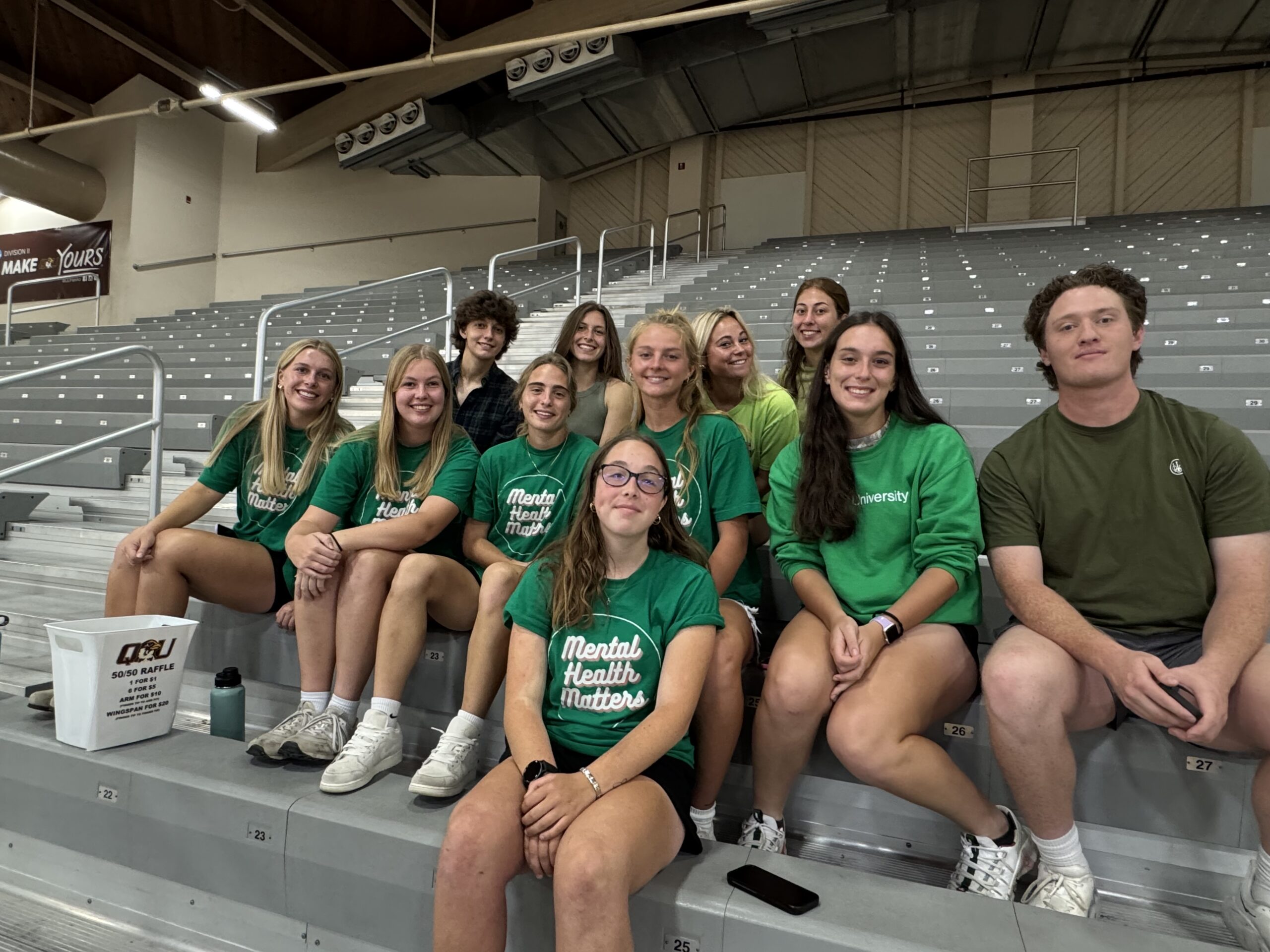 photo of students in Pepsi Arena wearing mental health awareness gear