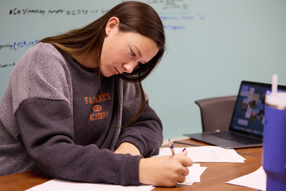 Student working on paper