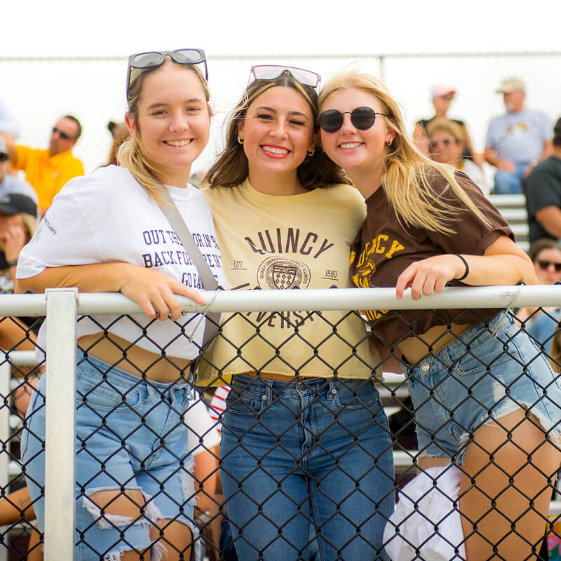 Students standing together at school event