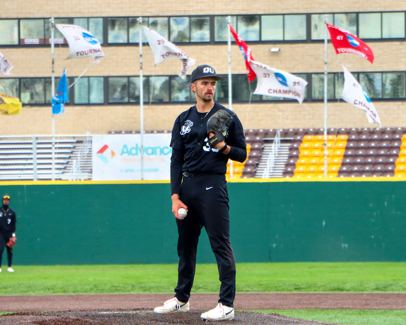 Men's baseball pitcher on the mound