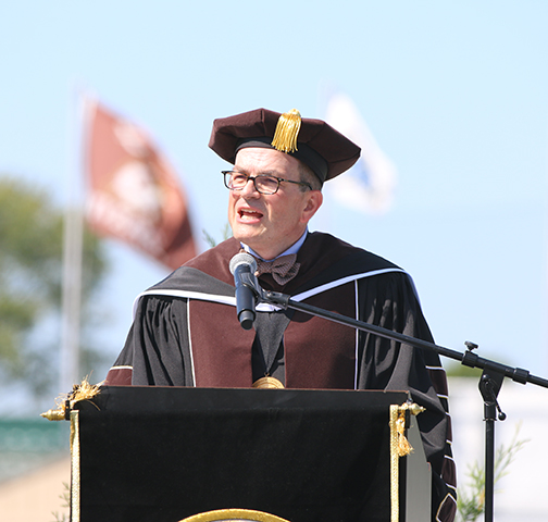 photo of Brian McGee on his first day as QU president