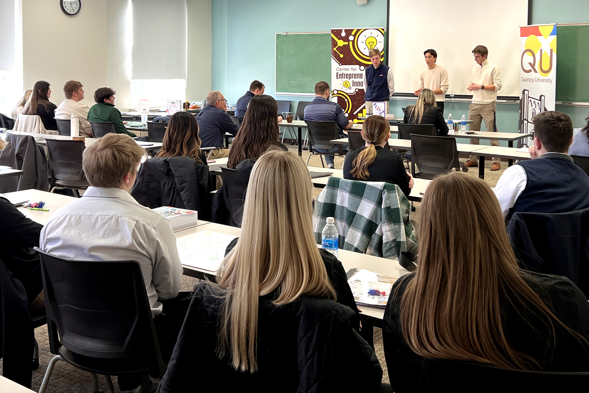 students in a classroom watching a speaker
