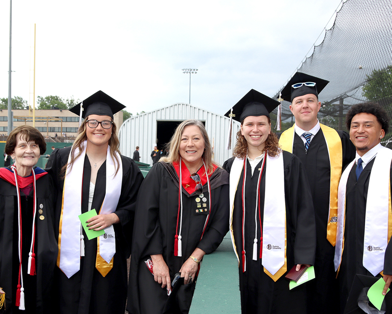 group of grads and professors