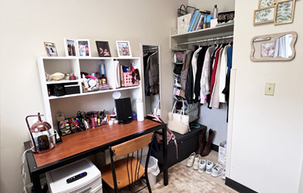student living center bed, desk and closet