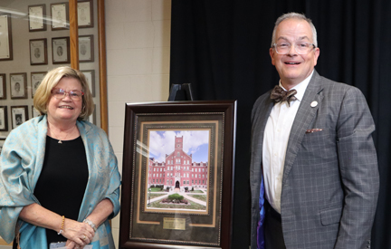 QU President with Alumni Award winner Maureen