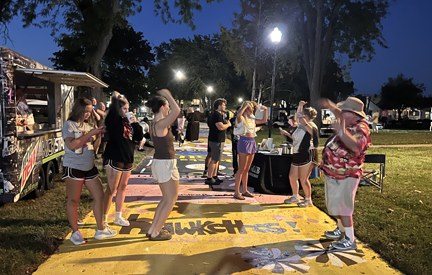 Party on Penny Lane with people dancing